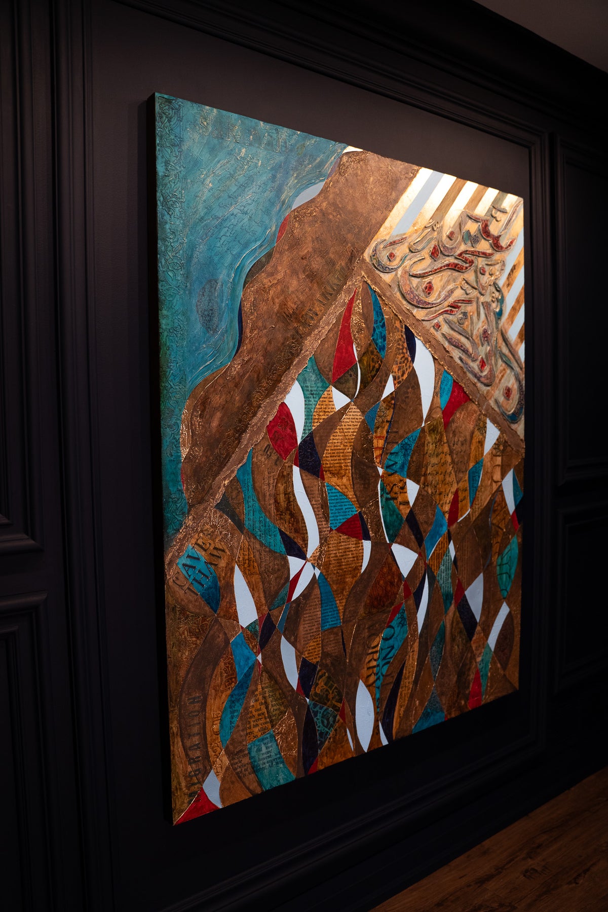 The Hijrah Islamic painting on a dark gallery wall, angled view