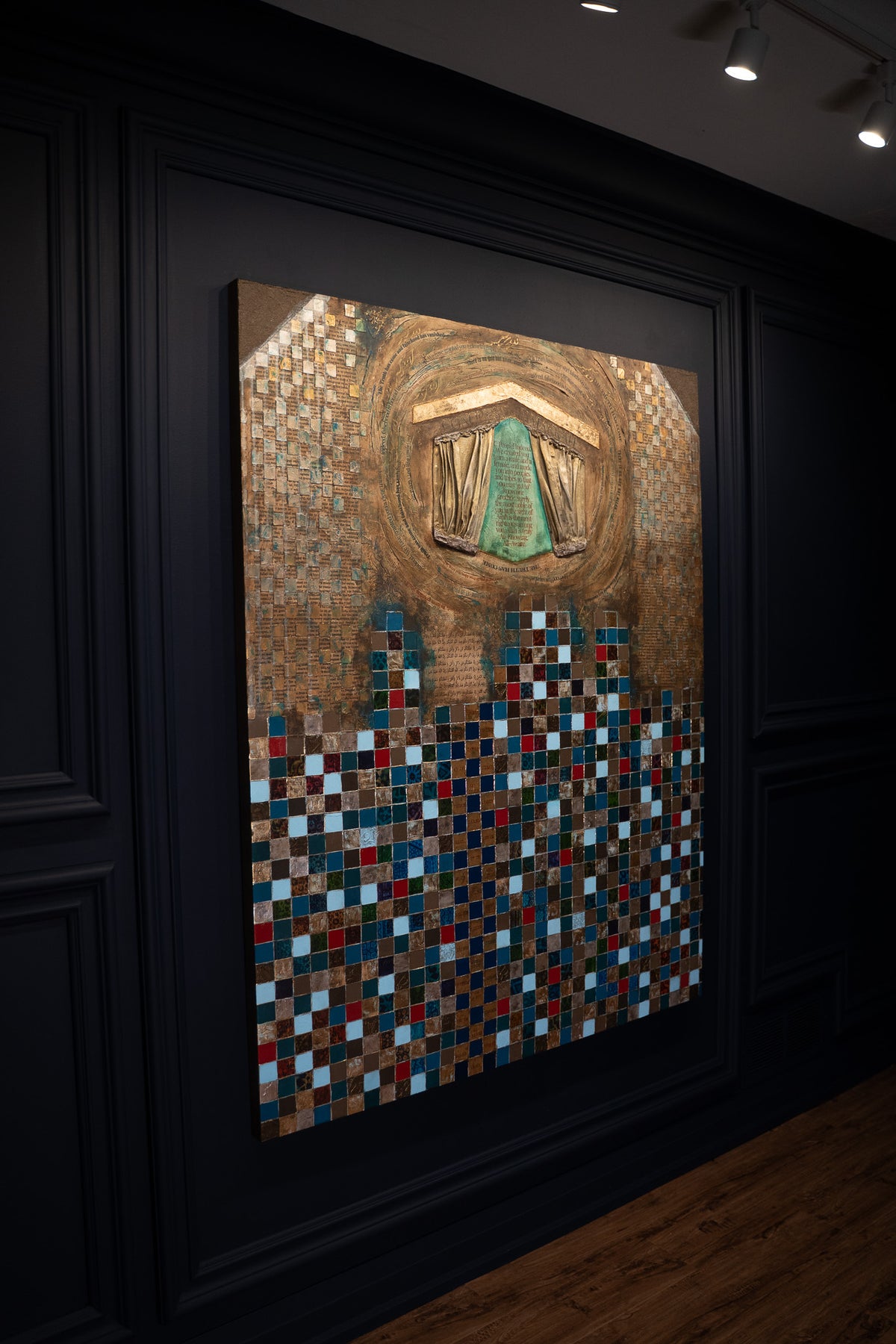 Conquest of Makkah Islamic painting on a dark gallery wall, angled view