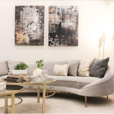 Gallery wall of Saleha Art prints in a client's home