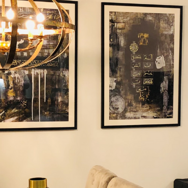 Gallery wall of Saleha Art prints in a client's home