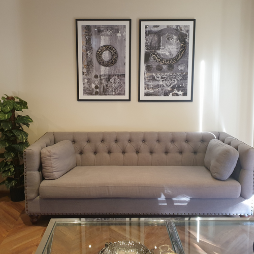 Gallery wall of Saleha Art prints in a client's home