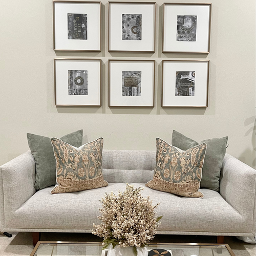 Gallery wall of Saleha Art prints in a client's home