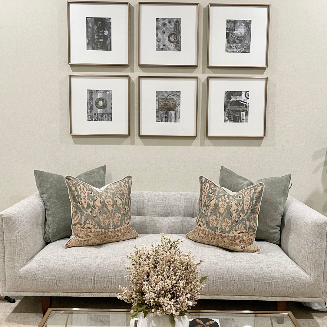 Gallery wall of Saleha Art Islamic prints in a home