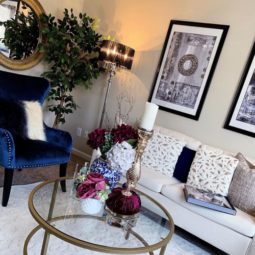 Gallery wall of Saleha Art prints in a client's home